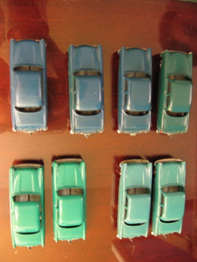 This is a composite image of my Blue Zodiac along with those of another collector friend assembled at my place in 2007. To the right of the upper row is a standard Dark Green model. The two at lower left are Sea Green, with GPW's. The two at right are Sea Green, one with GPW and the other with MW.