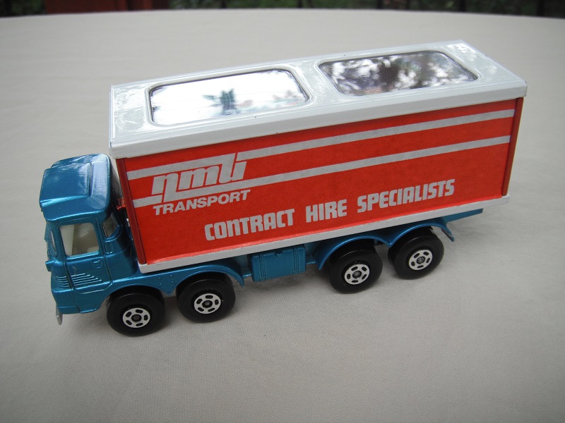 2. Promo/Met blu cab/bronze-red container/sil-gry base/wht roof/5 spk star whsl/blk plastic axle cover/NMU