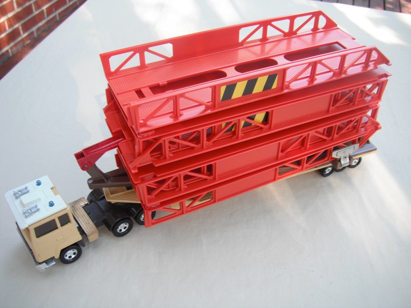 11. Beige cab &amp; brown base (1)/gold fuel tanks/blu lts/amber windows/dk.orange bridge/tan trailer/brown cradle/brown axle cover.