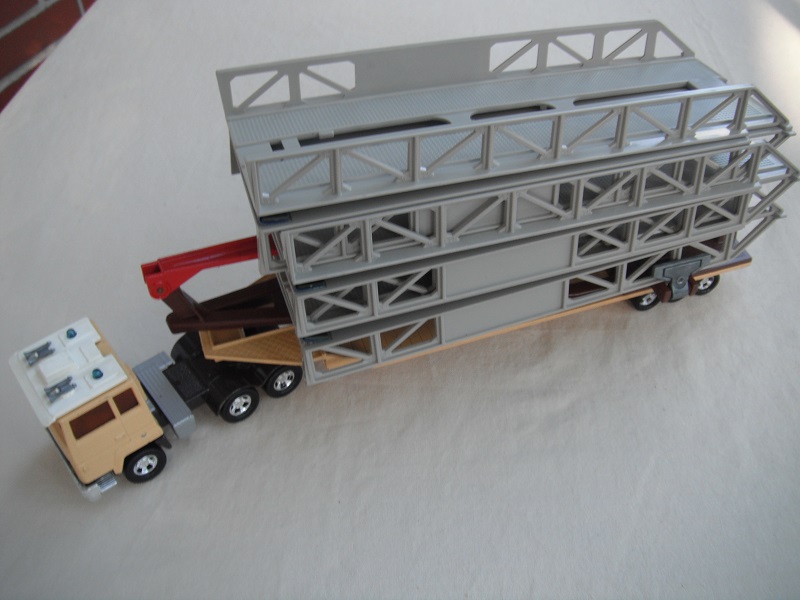 1. PP/beige cab/dk.brown base(2) amber windows/silver fuel tanks/blu lts/gry bridge/tan trailer/brn axle cover.