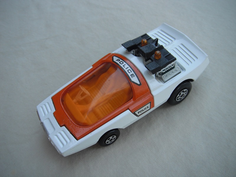 10. White &amp; orange body/matt black base/dk.yellow interior/amber windshield/white steering wheel/amber dome light.