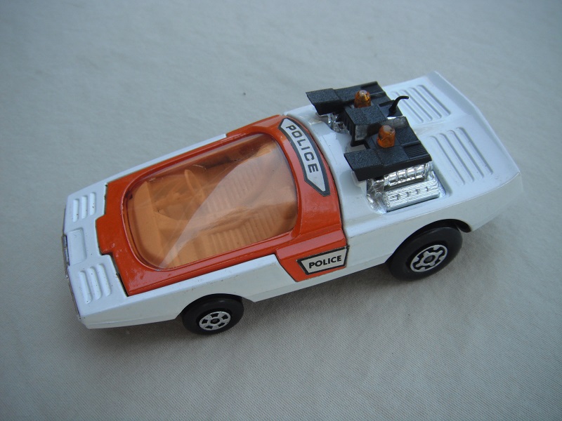 3. White &amp; orange body/matt black base/white interior/lt. amber windshield/white steering wheel/amber dome light.