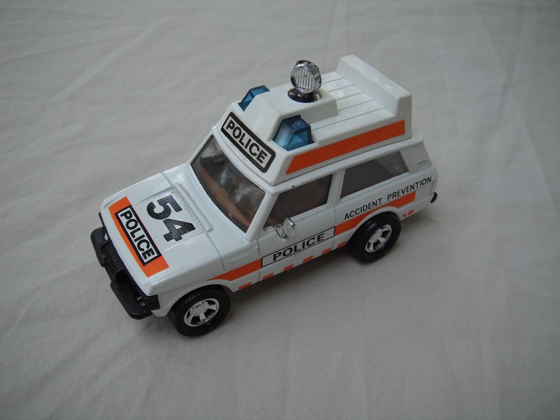 3. White body &amp; roof/gloss black base/dark blue roof light/small Police decal.