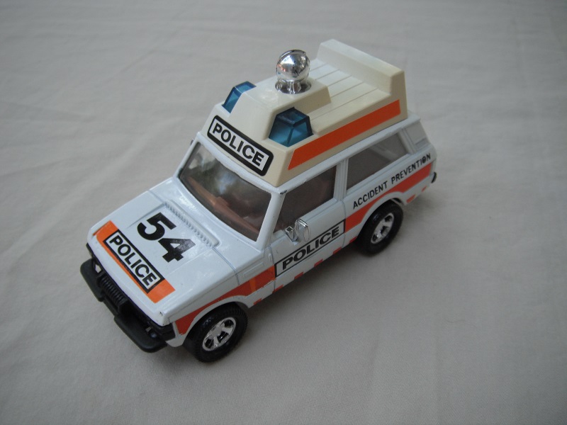 2. White body &amp; roof/matt black metal base/dark blue roof lights/large Police decal.