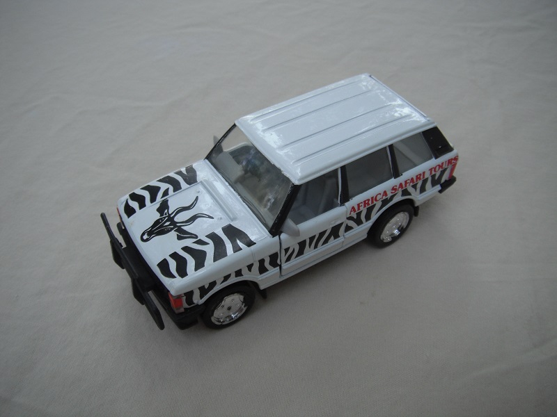 3. White body Safari/black plastic base/clear windshield/gray interior/China cast.