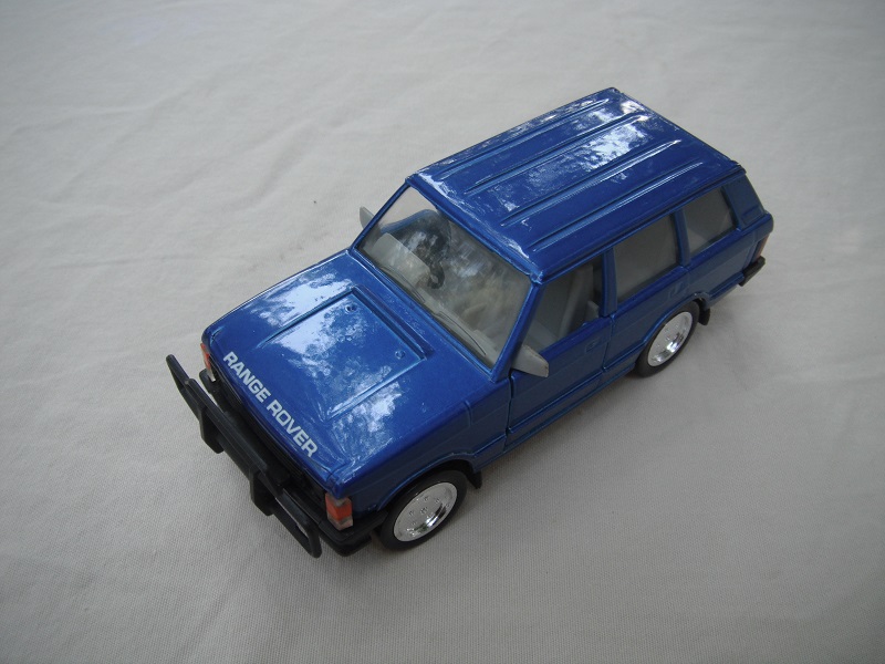 1. Metallic blue body/black plastic base/clear windshield/gray interior/Macau cast.