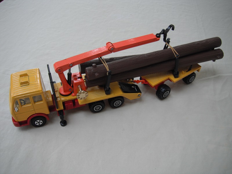 8. Yellow body &amp; dark red chassis/tan interior/clear windshield/dark red base/gold crank knob/orange hook w/brown cable.