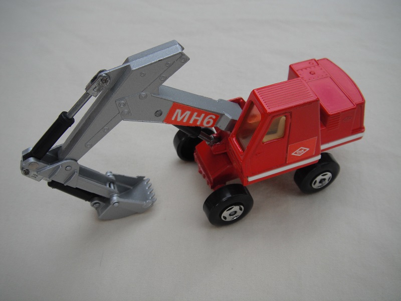 4. Red &amp; silver body/4 spoke wheels/silver scoop/light amber windows/red MH6 &amp; small red O&amp;K labels on left side only.