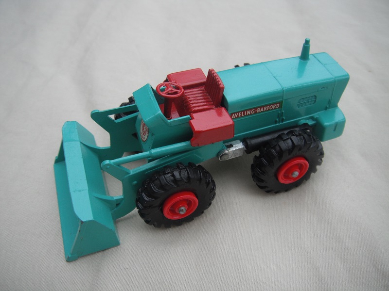 1. Mint green body/black plastic tires with red hubs/Aveling Barford decals/large front decal/no air filter on side.