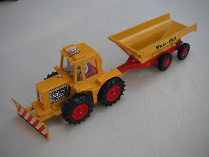 10. Dark yellow tractor/type 2 plow/thick tires/clear windows/diff trans type driver/dark red interior/yellow &amp; red trailer/small tires/type 1 tow bar/Muir-Hill label.