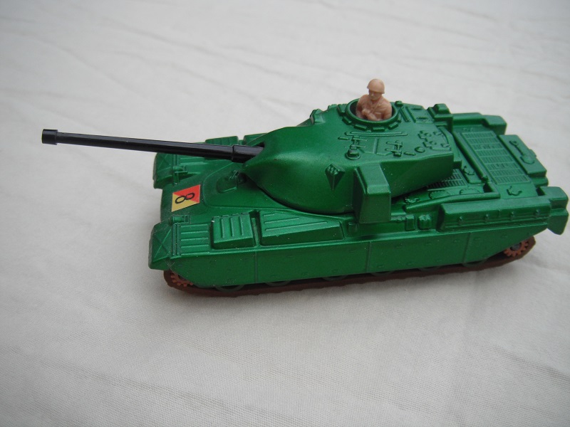 4.  Metallic green body/gloss black base/green rollers/dark brown cog/brown tracks/pinkish-tan driver/#8 label.