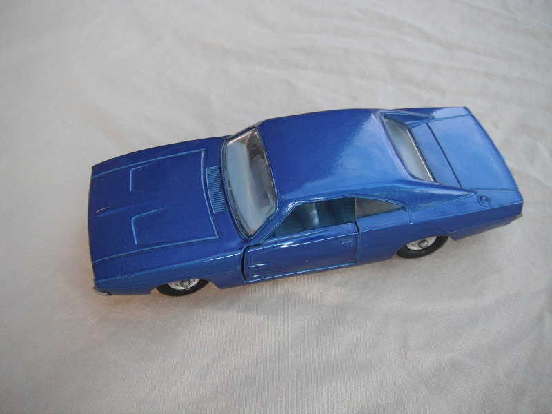 1.  Blue body/unpainted base/clear widows/pale blue interior/black plastic tires with chrome hubs.