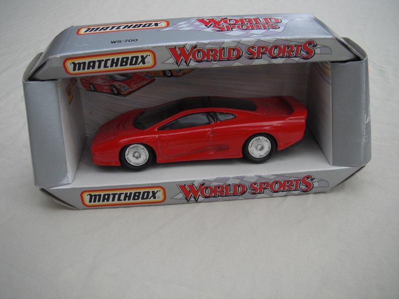 2. Red body/black base China/smoked windows/chrome disc wheels.