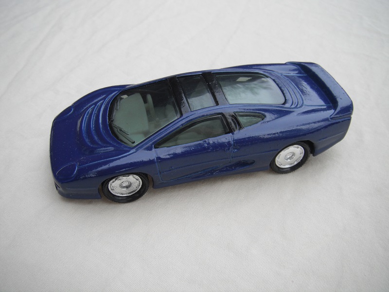 1. Blue body/black base China/smoked windows/chrome disc wheels.