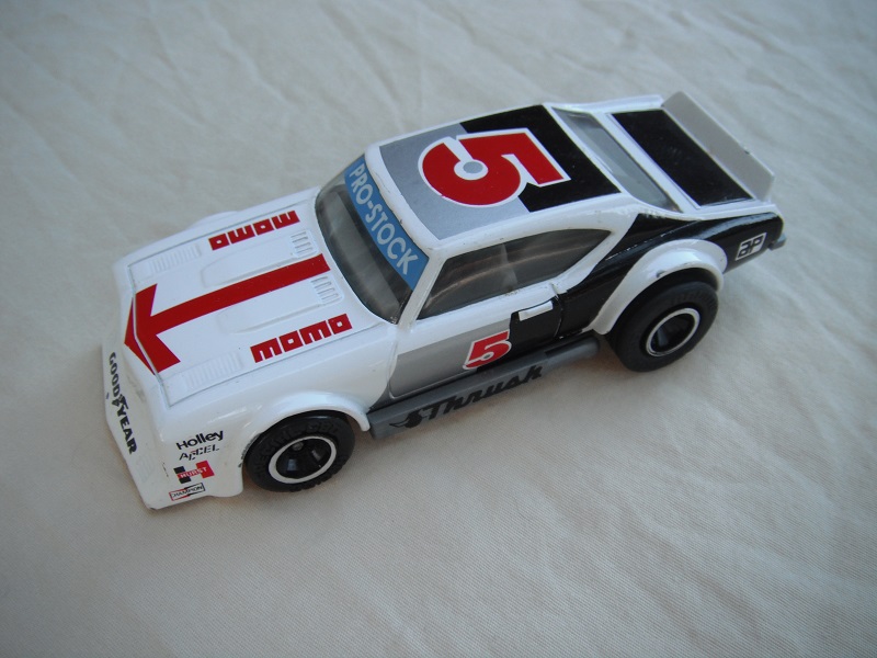 7. White body with silver&amp; black/gray base Macau/gray interior/clear windows/black wheels/pullback motor/Pro-Stock on windshield/Momo #5.