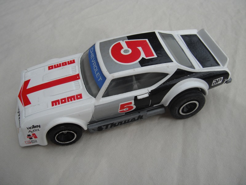 6. White body with silver&amp; black/gray base Macau/gray interior/clear windows/black wheels/pullback motor/Chevrolet on windshield/Momo #5.