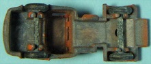 1F TOT OOO Body Style #1 Typical Bottom View of Lorry Cab Bronze Metal Wheels & Axels.JPG