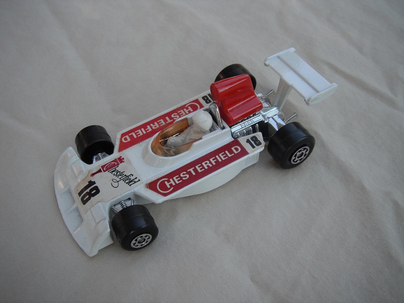 1. White body &amp; red spoiler/white Superking base/white airfoil/dk.amber windshield/white driver w/large white helmet/&quot;Chesterfield 18&quot; in dk.red labels.