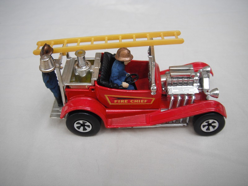 K53A Hot Fire Engine dark blue firemen with gold helmets.jpg