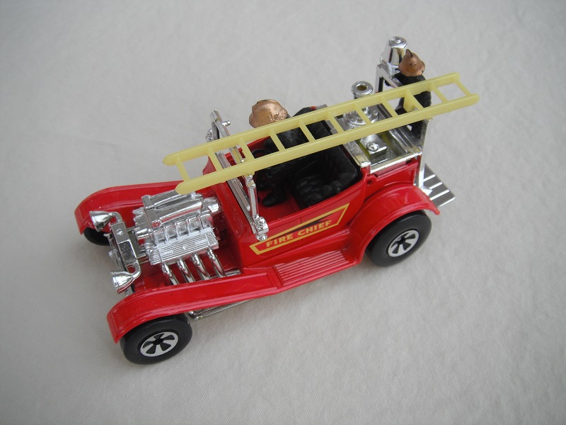 12. Red body/K50-53 Speedkings base/lemon yellow ladder/'Fire Chief' labels/black firemen with gold helmets.