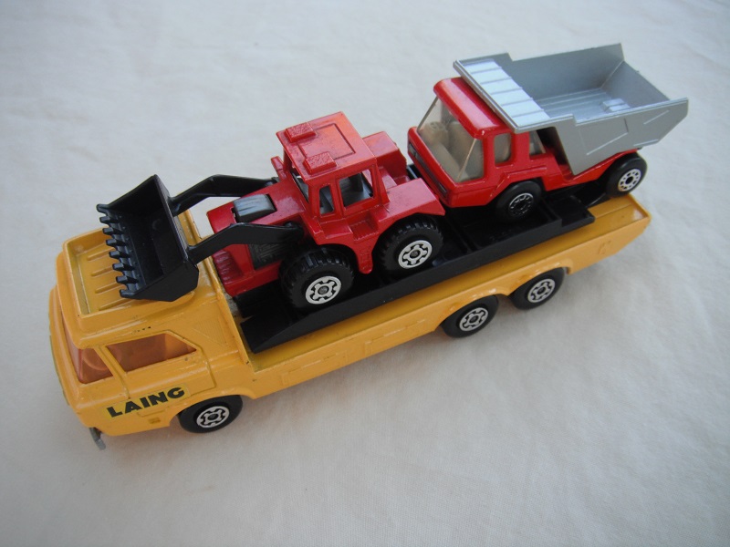 4. Dark yellow body/silver base/yellow interior/amber windshield/black loading ramp/&quot;Laing&quot; label on cab/MB23 &amp; MB29 in orange &amp; silver.