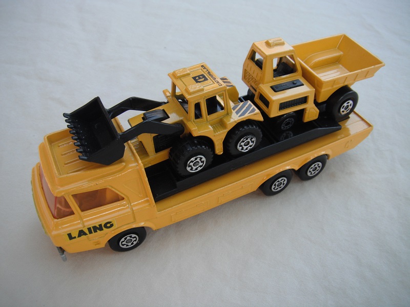 3. Dark yellow body/silver base/yellow interior/amber windshield/black loading ramp/&quot;Laing&quot; label on cab/MB26 &amp; MB29 in yellow &amp; black.