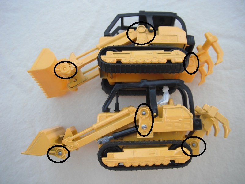 K42B Traxcavator Road Ripper differences between metal & plastic parts.jpg