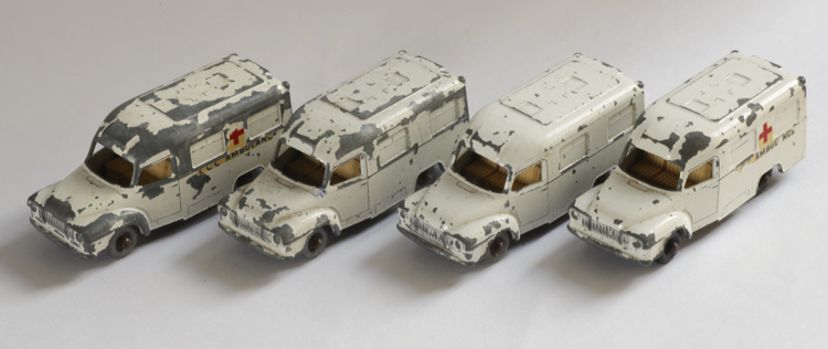 14c Lomas ambulances. From left wheels are: silver, silver, grey, black.