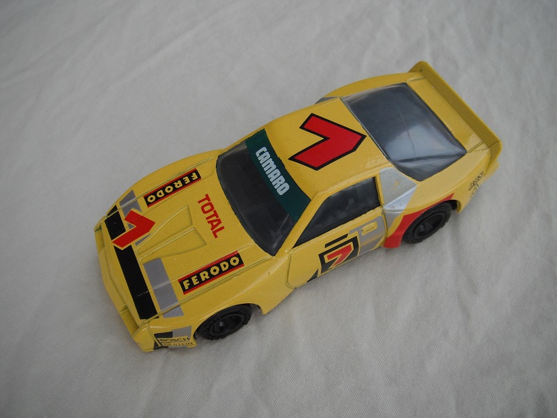 8. Yellow body with silver &amp; black stripes/black base China/black interior/no chrome lettering on wheels/Ferodo #7.