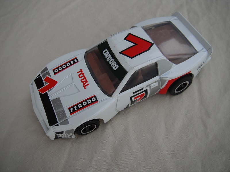 6. White body with silver &amp; black stripes/black base Macau/brown interior/black wheels/pullback motor/Ferodo #7.