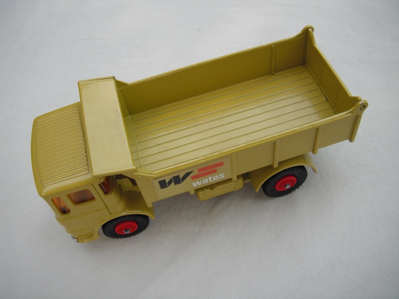 3. Lime green cab &amp; tipper/silver base/black plastic tires/amber windows/silver grill &amp; bumper/W.Wates label/out #7 tailgate.