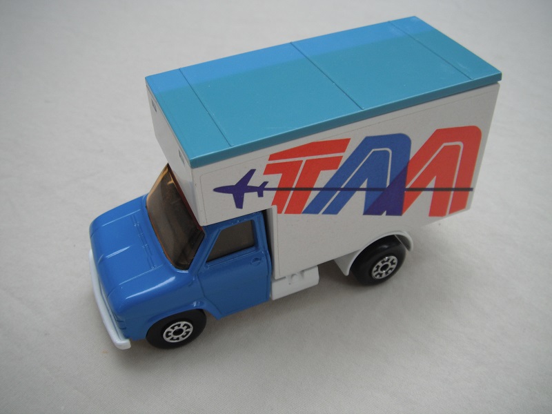 3. Blue cab/white base/lt.blue roof/lt.amber windows/5 arch(f)5 crown(r) wheels/blk axle cover/TAA labels.