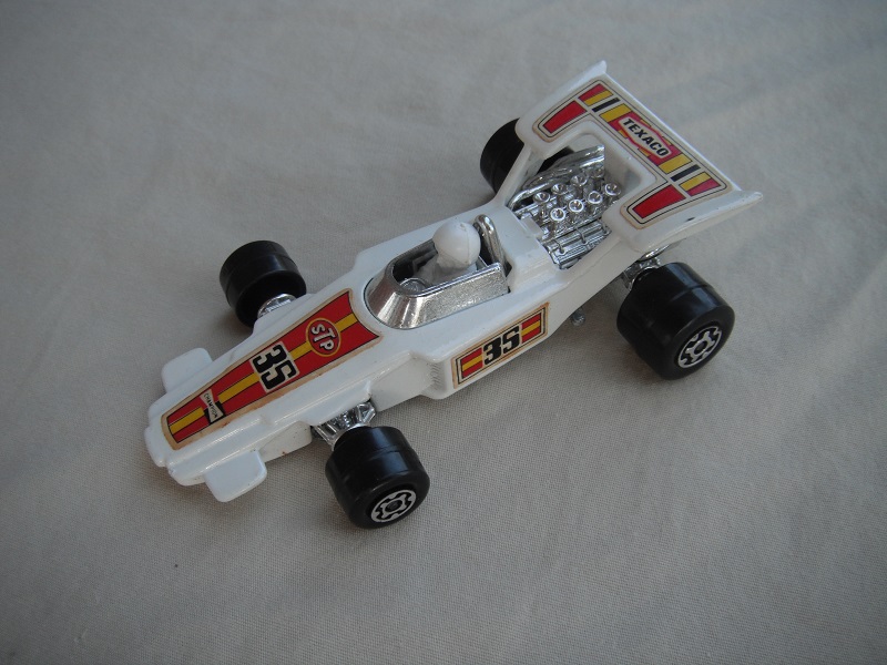 13. White body/unpainted Speedkings base/type A wheels/white driver with large white helmet/&quot;35 STP &amp; Texaco&quot; labels/rectangular side labels.