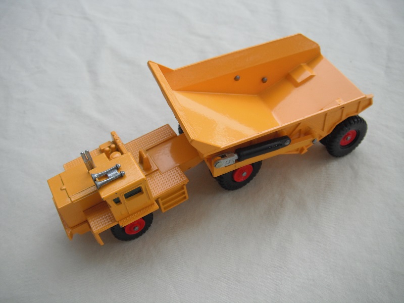 5. Dark yellow body/type 3 base/with rivet braces/plate on cab's rear axle/green windows/KW-Dart decals.