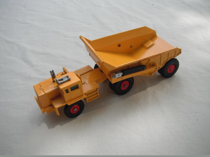 3. Yellow body/type 2 base/with rivet braces/plate on cab's rear axle/green windows/KW-Dart decals.
