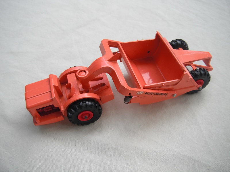 4. Orange body/red plastic hubs/orange pivot boss/&quot;Allis-Chalmers 260&quot; decals.