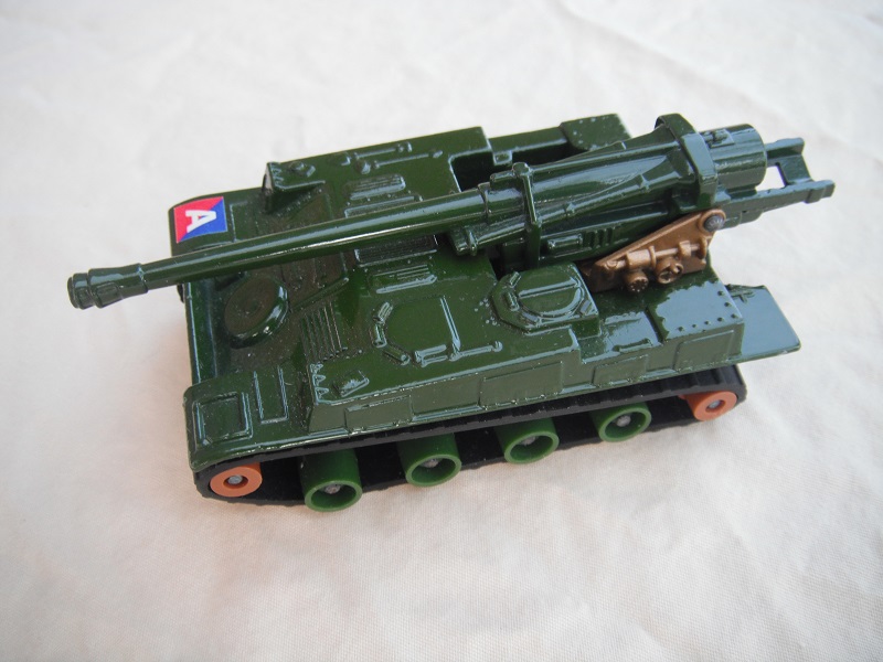 4. Gloss olive green body/matt blk base/dk.green rollers/smooth brown cog/gold turret/beige gun elevator.