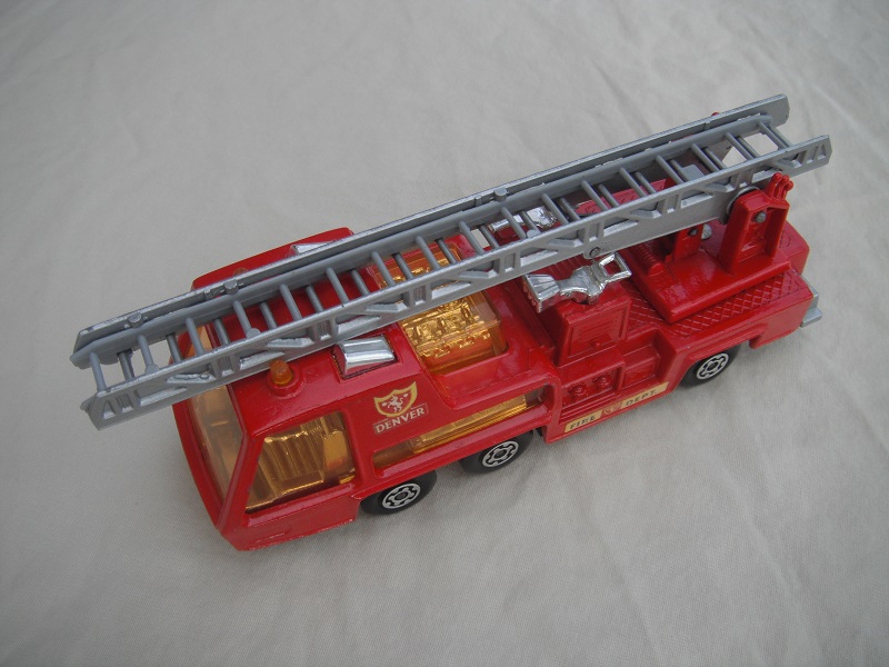 5.  Red body/silver base/red ladder platform/amber windows/gray ladder insert/Denver &amp; Fire Dept labels.