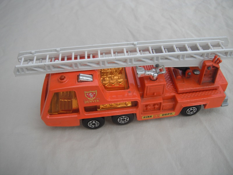 1.  PP/Orange body/silver base/dark amber window/white ladder/Denver &amp; Fire Dept labels.