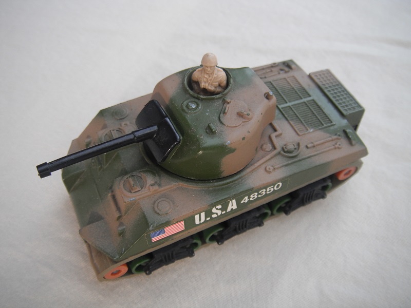 16. Green &amp; dark tan camouflage body/matt blk base/green rollers/smooth tan cog/gry tracks/green USA 48350 label/tan driver.