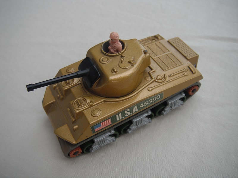 9. Gold body/silver base/green rollers/brown cog with gears/gray tracks/green USA 48350 label/tan driver.