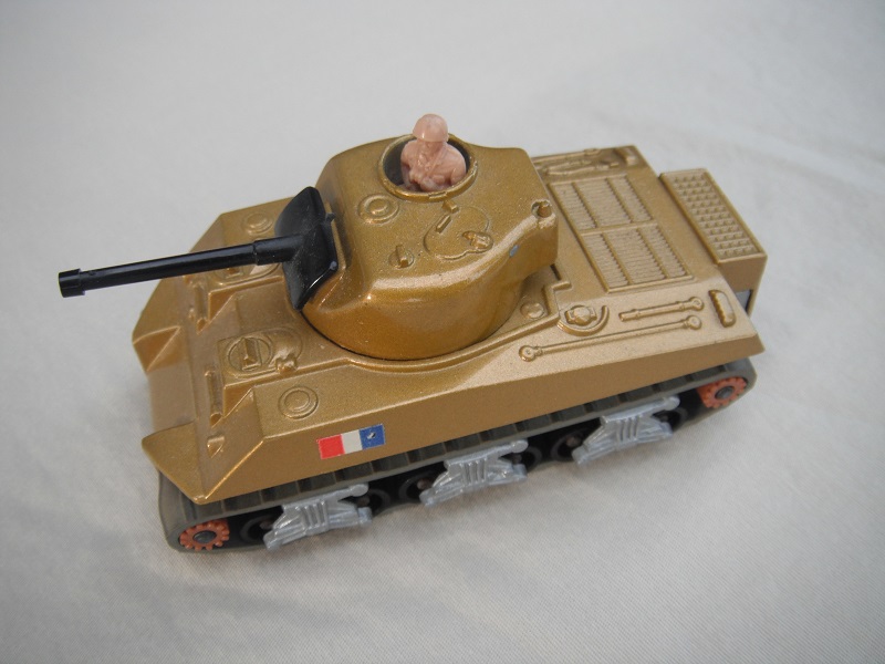 3. PP/Gold body/silver base/black rollers/brown cog with gears/gray tracks/French flag label/beige driver.