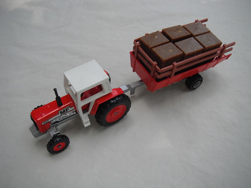 3. Red body/wht canopy/sil base England/opn/BPT/red hubs/wht steering/red tlr/lt.brn stakes/sil base #1/8 dot chrm whls/wht tow eye/MF 595 labels.
