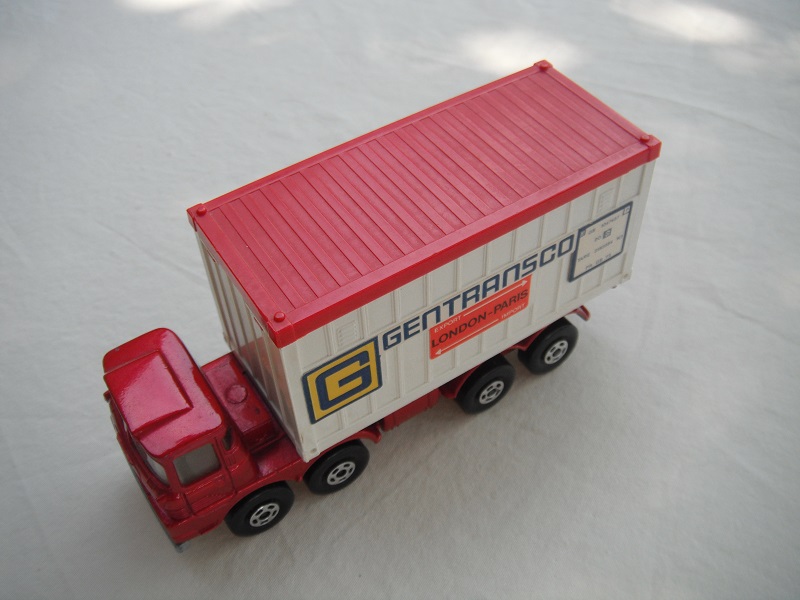 4. Met.red cab/sil base type b/blk closed axle cover/wht container w/red roof/Gentransco labels in dk.blue.