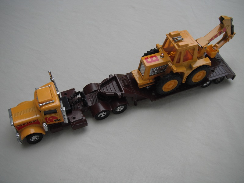 2. Dk.yel cab/dk.brn base/5 spk mag whls/clr wind/blk strg/dk.brn tlr &amp; base/dk.yel digger/amb wind/dk.red int/yel scoop.
