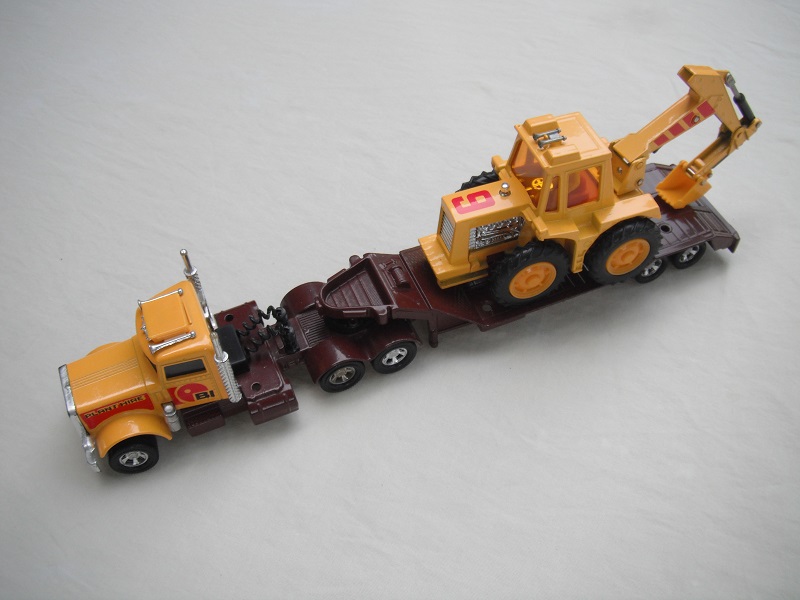 1. Yel cab/dk.brn base/5 spk mag whls/clr wind/dk.grn strg/dk.brn tlr &amp; base/yel digger/amb wind/dk.red int/yel scoop.