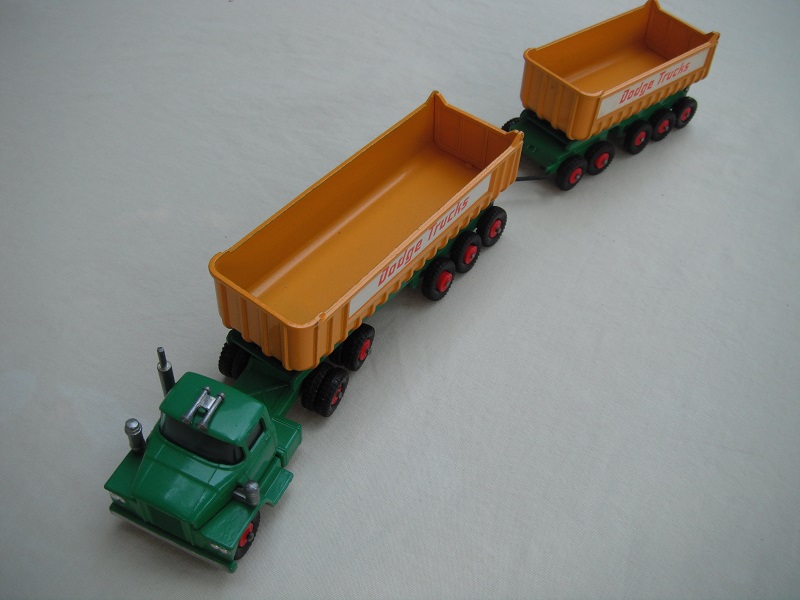 7.Green cab/type 4 base/blue tint axle holder/dk.yel tipper/type 3 underside/type b tailgate area/&quot;Dodge trucks&quot; in red letters.