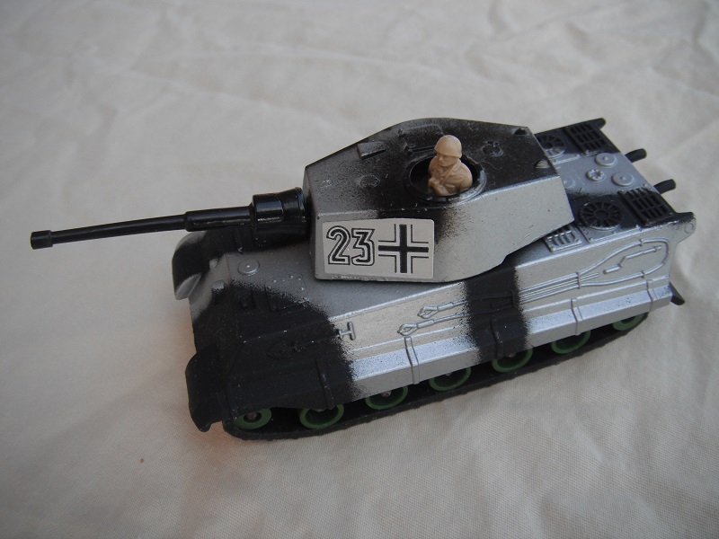 9. Silver &amp; black camouflage body/matt black base/green rollers/smooth grn cog/blk tracks/#23 &amp; cross labels/cream driver.