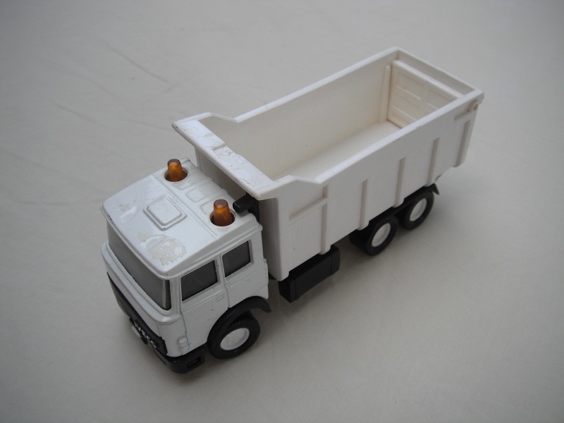 1. PP/White cab/black chassis/white tipper/white Macau base/white 8 dot disc wheels/clear windows/black interior.