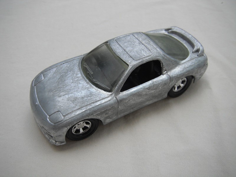 1. PP/Unpainted body/blank base/chrome star dish wheels/clear windows/black interior.